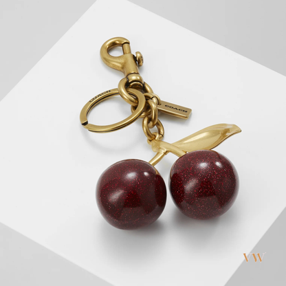 Coach cherry charm gold and red