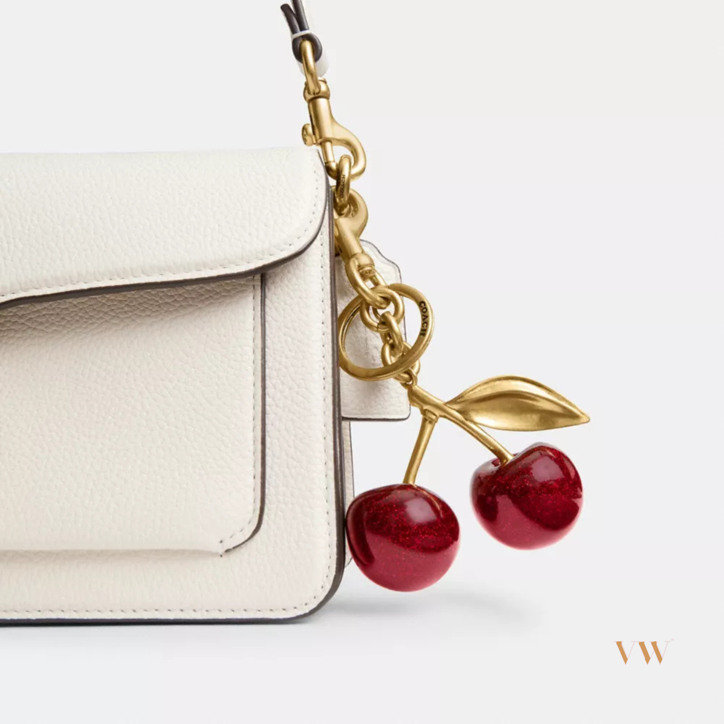 Coach cherry charm gold and red